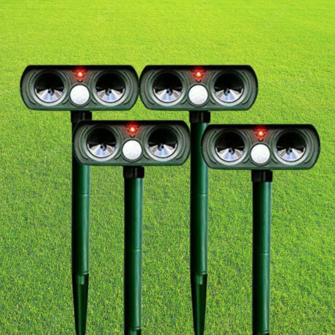 Solar animal repeller with motion sensor and ultrasonic waves