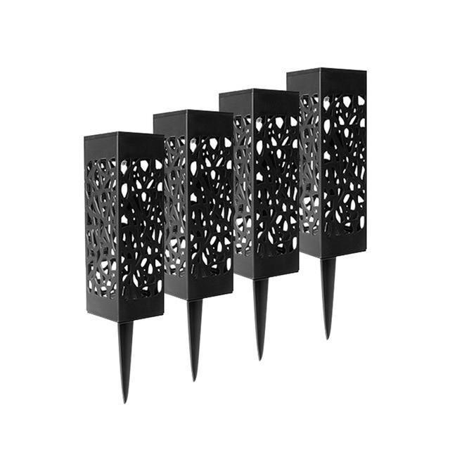 Dekoracyjna solarna latarnia ogrodowa tworzaca nastrojowe cienie