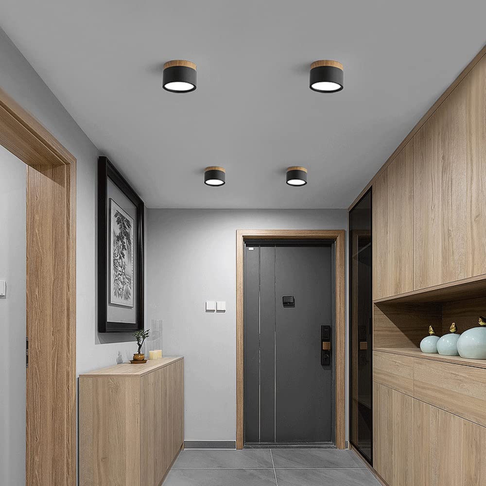 Plafondlamp met cilindervormige behuizing en rond licht