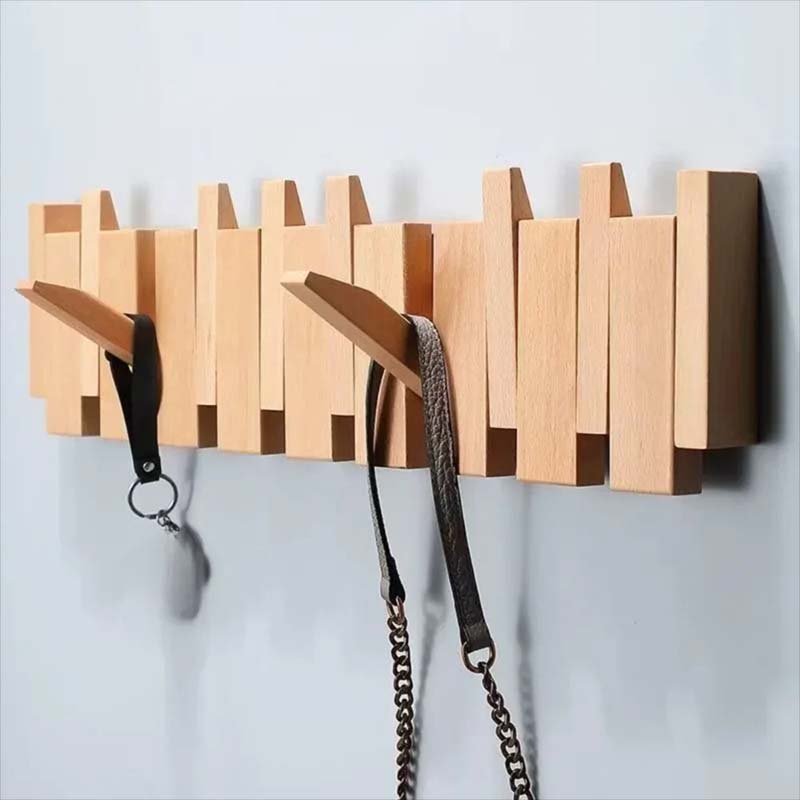 Drewniany wieszak ścienny składany z uchylnymi hakami