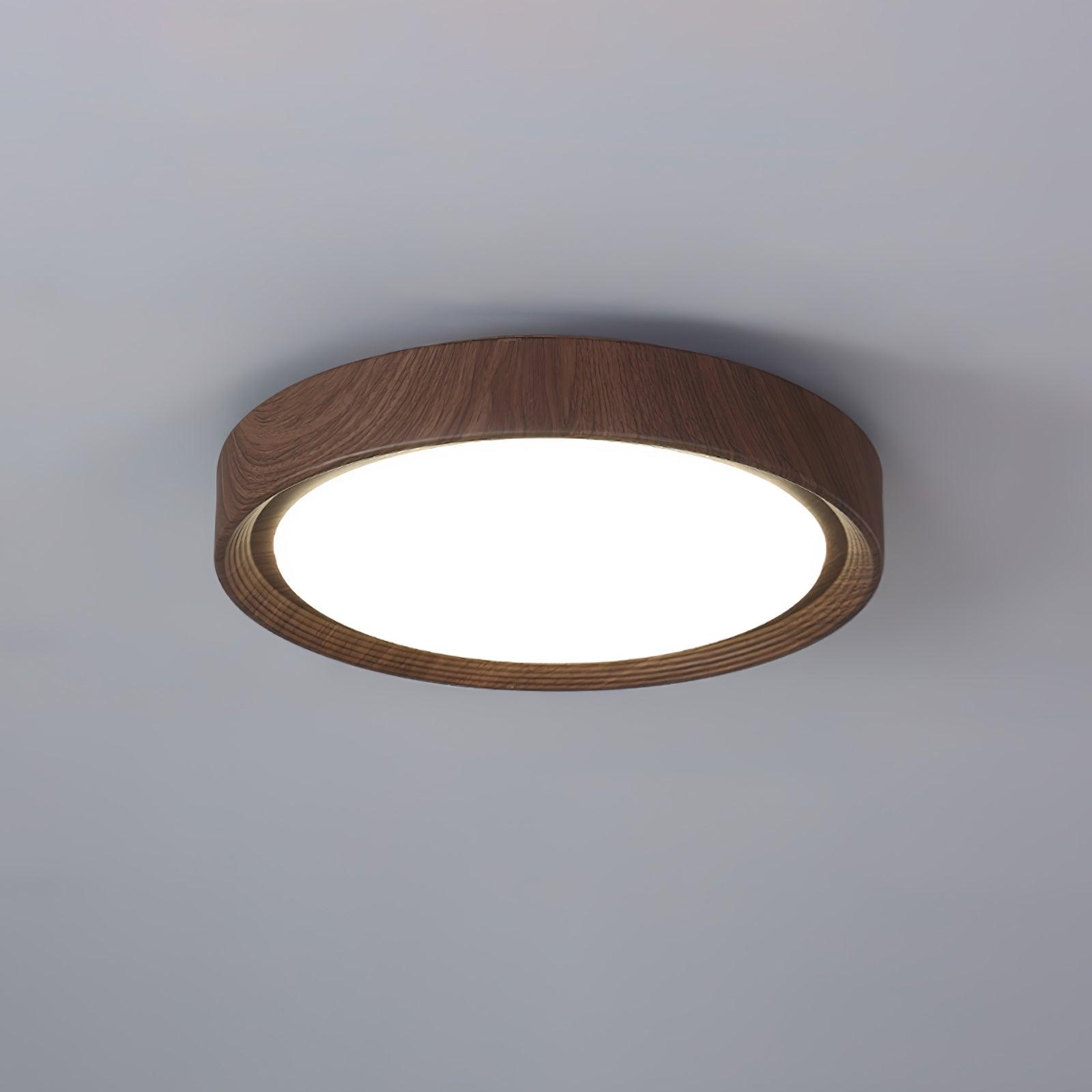 Ronde plafondlamp met behuizing in houtstructuur