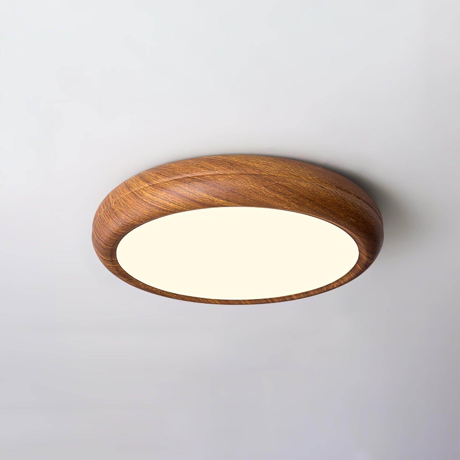 Ronde plafondlamp met behuizing in houtstructuur