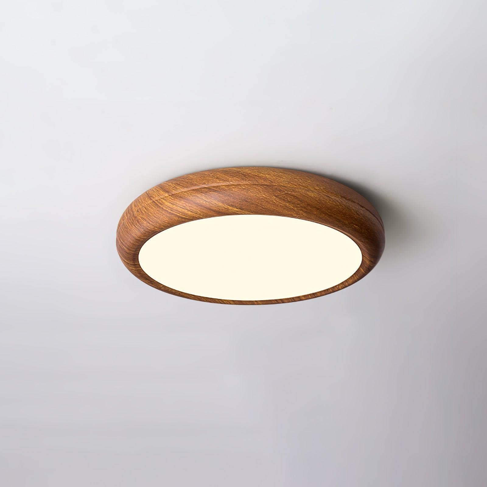 Ronde plafondlamp met behuizing in houtstructuur