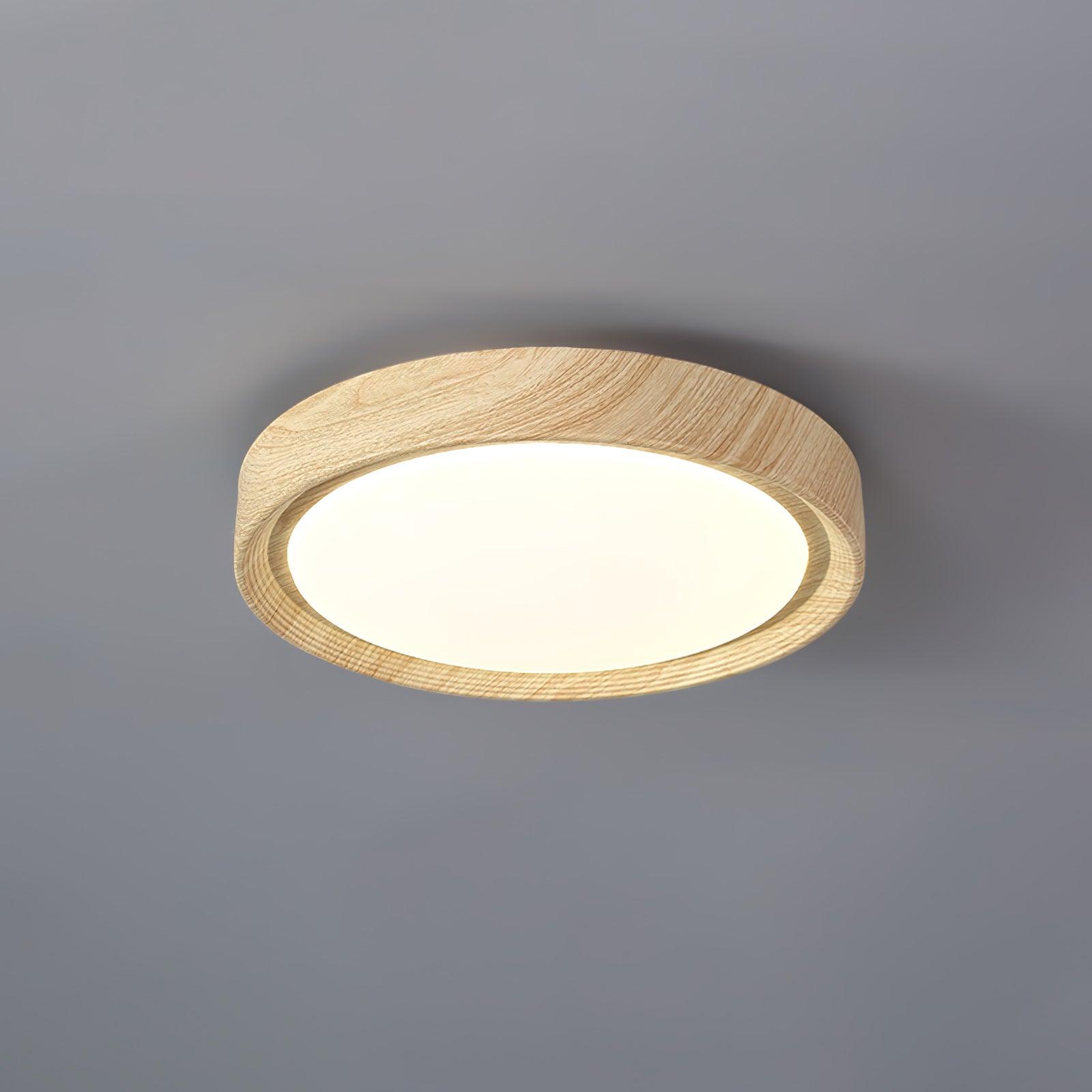 Ronde plafondlamp met behuizing in houtstructuur