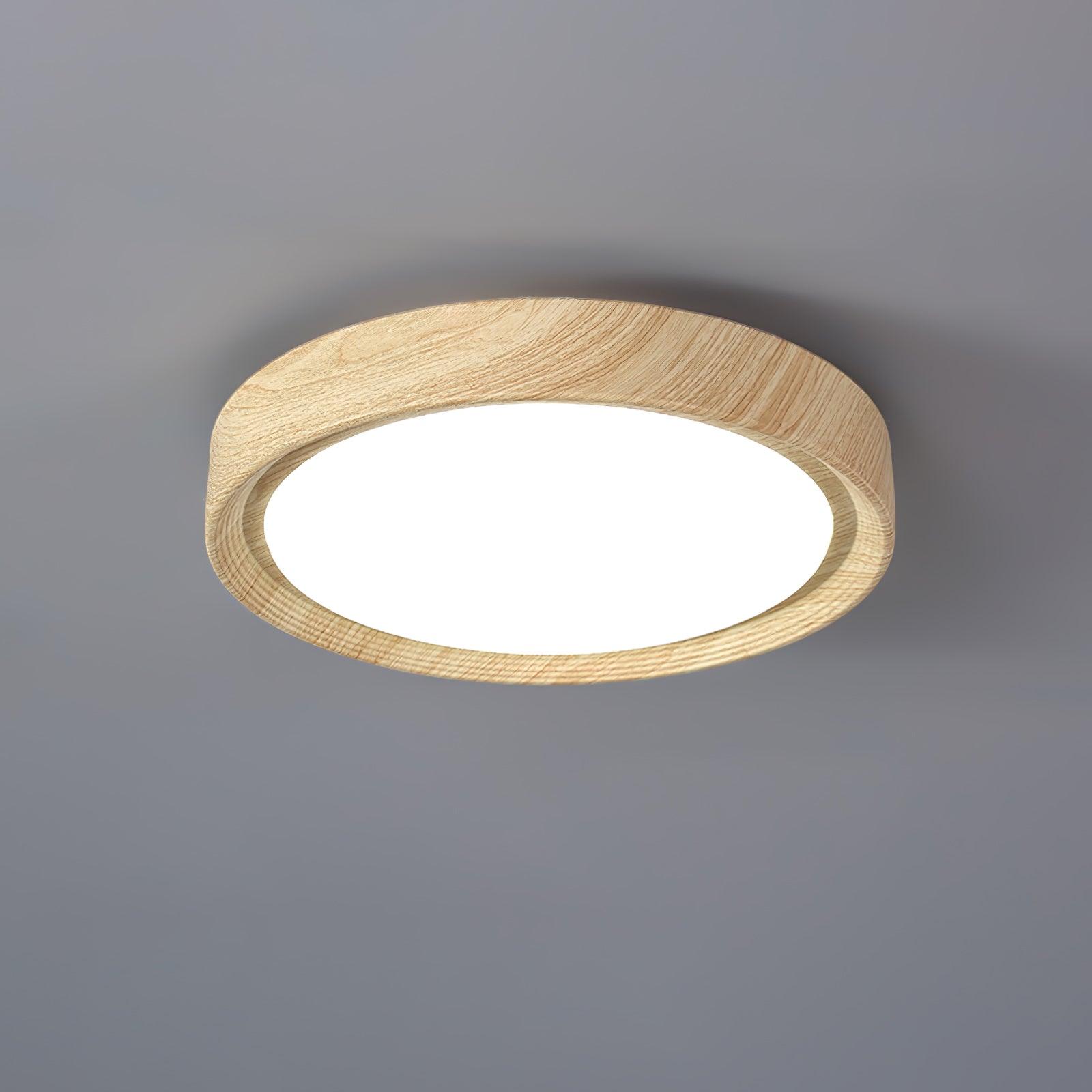 Ronde plafondlamp met behuizing in houtstructuur