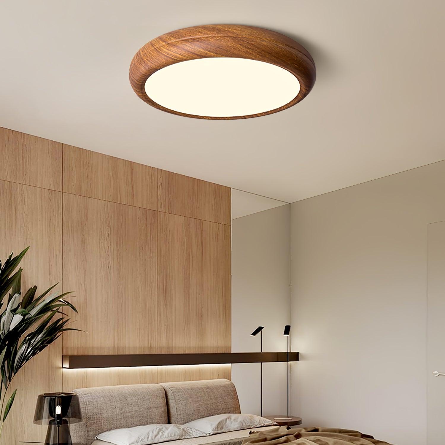 Ronde plafondlamp met behuizing in houtstructuur